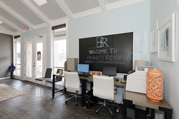 Image of business center with computers, desks, chairs, and printer available for use  at Bennett Ridge Apartments, Oklahoma City, OK, 73132